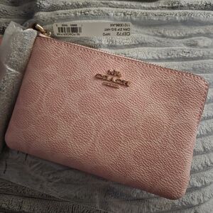 Coach powder pink corners zip wristlet